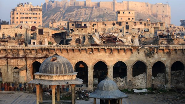 The Aleppo citadel and the heavily damaged Grand Umayyad mosque in the old city of Aleppo, Syria.