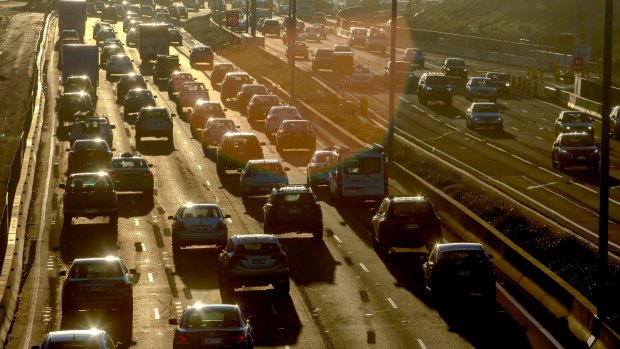 Early morning traffic crawls towards the airport.