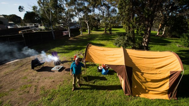 A protester in 2016 camps out in the Caulfield Reserve to highlight restrictions on its use as public open space. 