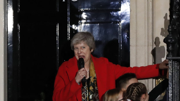 Britain's Prime Minister Theresa May attends the ceremony to light up a Christmas tree at 10 Downing Street in London, on Thursday.