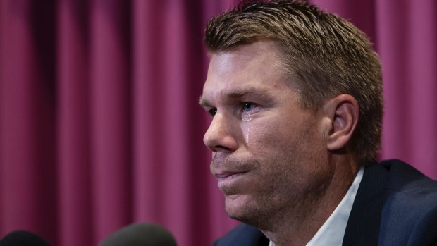 Outside looking in: David Warner fronts the media after his ball-tampering ban in March.