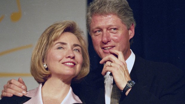  June 22, 1994: President Bill Clinton and first lady Hillary Clinton wait to address a group of young Democratic supporters known as the Saxophone Club in Washington.