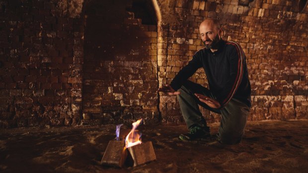 Thor's Hammer owner Thor Diesendorf with fire bricks made from waste sawdust at the previous Canberra Brickworks site.