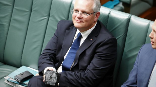 Then treasurer Scott Morrison with a lump of coal during question time last year.
