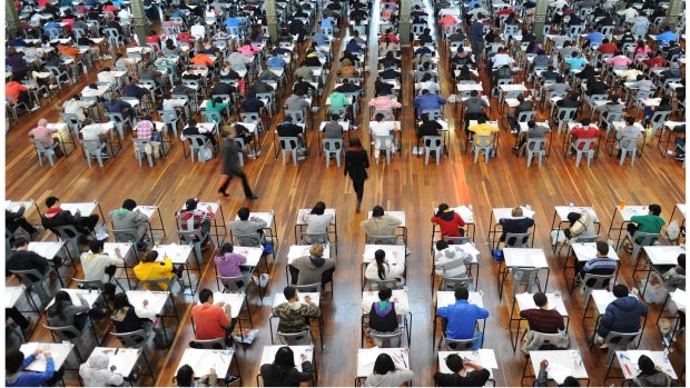 Queensland's year 12 students will sit four exams from 2020 as the OP score system is scrapped.