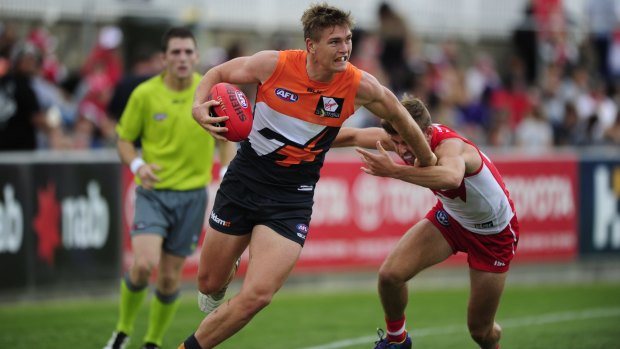 GWS Giants player Adam Tomlinson thinks incidents like Andrew Gaff's punch should be left to the AFL tribunal and not the courts.