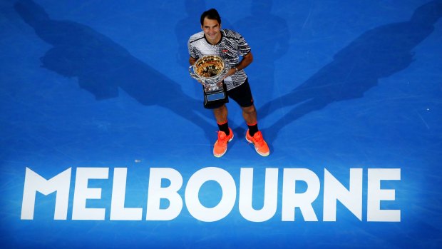 Back on top: Roger Federer celebrates his 2017 Australian Open triumph.