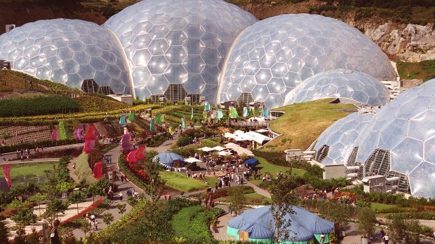 The enormous geodesic domes of the Eden Project cover a former china clay pit in Cornwall, England.