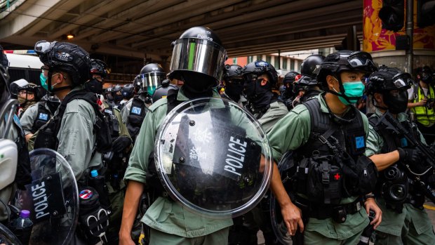 Riot police stand guard during an anti-government rally on May 24 in Hong Kong, China. 