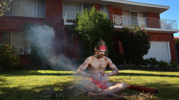 Brock Tutt prepares to perform a traditional smoking ceremony at his home in Matraville as part of the Haka and Corroboree for Life ANZAC online service on April 25, 2020 in Sydney, Australia. 