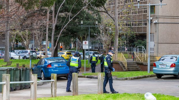 Police are seen on patrol outside the North Melbourne Public housing flats on July 05, 2020.