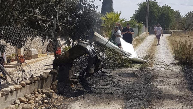 Authorities in Mallorca said seven people died in a collision between a helicopter and a light plane on the Spanish island. 