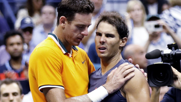 Withdrawal: Rafael Nadal (right) was forced to pull out of his US Open clash with Juan Martin