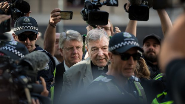 Cardinal George Pell arrives at the Melbourne County Court on Wednesday.
