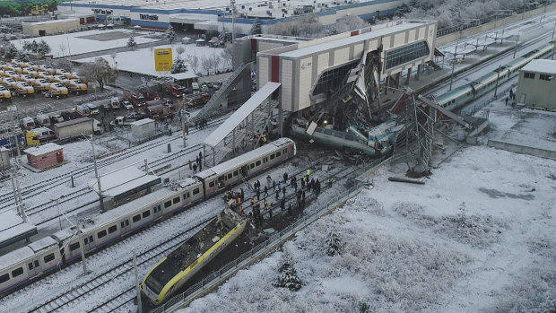 The train ran into a pedestrian overpass, killing several people.