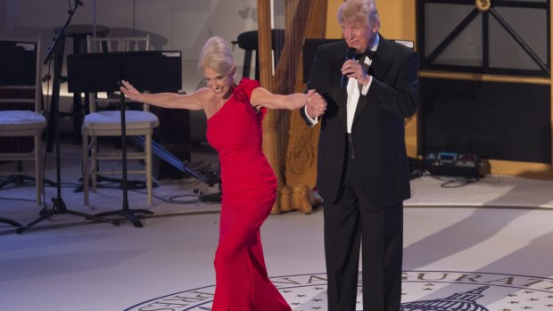 US President Donald Trump with senior adviser Kellyanne Conway during a lavish pre-inauguration dinner in January, 2017.