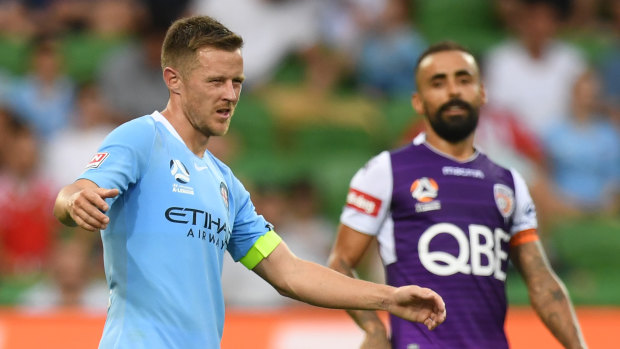 Gone begging: City's Scott Jamieson shows his frustration after a late long-range bullet from Diego Costa (right) helped Glory snatch a draw.