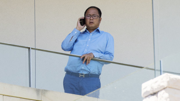 Chinese political donor Huang Xiangmo on the balcony of his Mosman mansion last year.