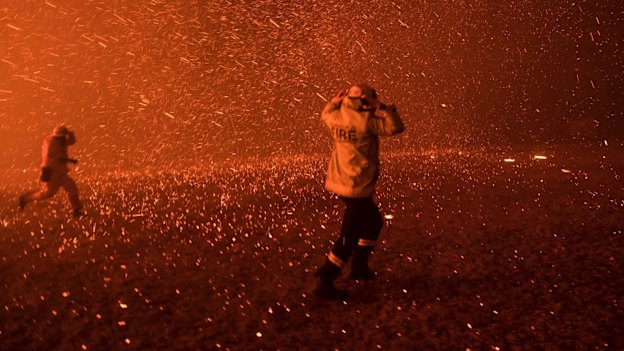 The Green Wattle Creek fire in Orangeville in December 2019. Councils have had their finances battered by the Black Summer bushfires and the pandemic.