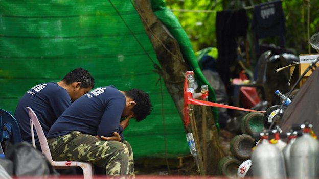 Thai navy personnel at the base camp at Tham Luang cave, the day after a former Thai navy seal died in the rescue efforts. 