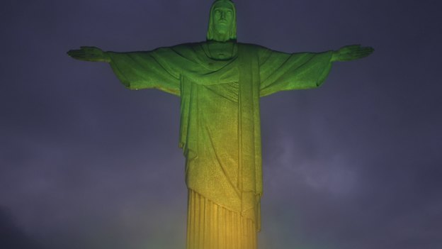 Christ the Redeemer statue is lit with the colours of the Brazilian flag to pay homage to late football legend Pele in Rio de Janeiro, Brazil.