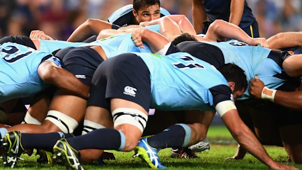 Nick Phipps of the Waratahs “feeds” a scrum.