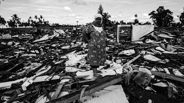 Some of the survivors amid the debris.