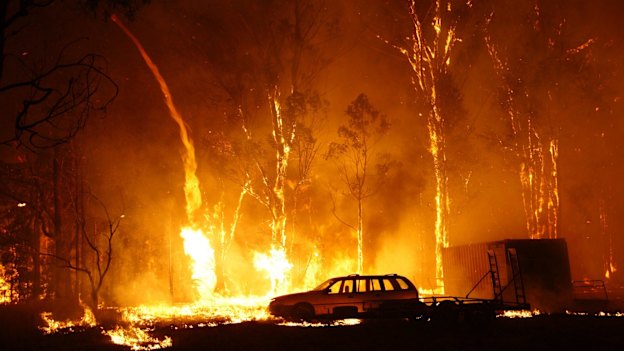 A burnt-out car at a property at Colo Heights.