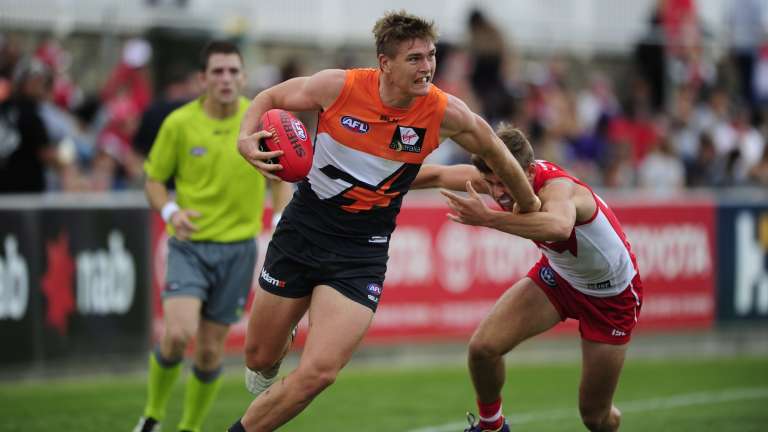 Road trip: GWS' Adam Tomlinson can't wait for a rare match at the home of football.