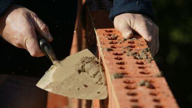 It's still a struggle to find key jobs like bricklayers and ceramic tilers, builders groups say. 