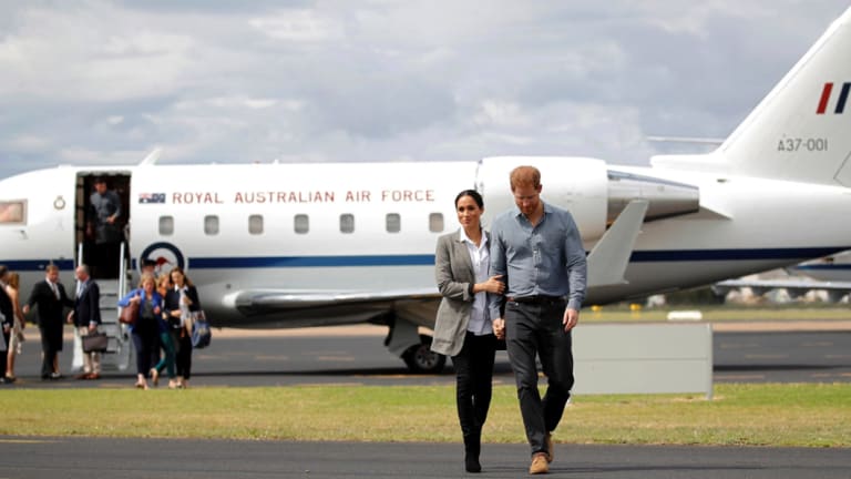 Fashion with a conscience ... Meghan wearing Outland Denim for her arrival to Dubbo with Prince Harry.