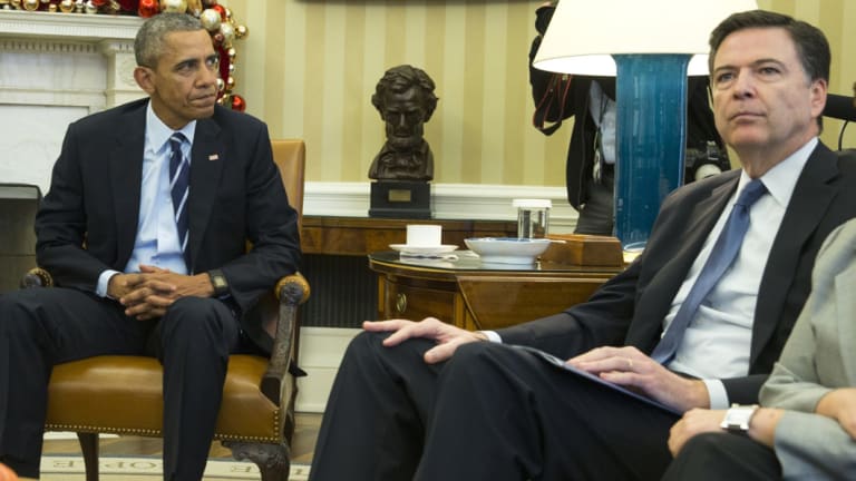 Encryption unresolved. US President Barack Obama and FBI director James Comey in the Oval Office of the White House after the San Bernardino massacre. 