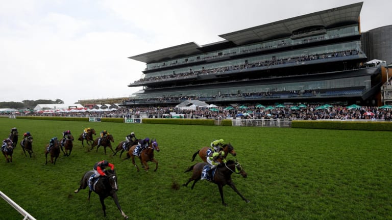 Stands full: Belflyer wins the Kosciuszko at Randwick on Saturday.