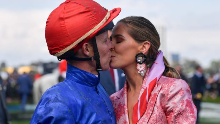 Stayer: There is no better jockey over long distances than Kerrin McEvoy, here with wife Cathy after yesterday's win.