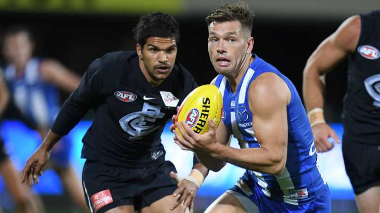 Classy Kangaroo: Shaun Higgins wins the ball.