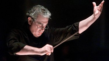 Placido Domingo directs the Washington Opera Orchestra and Chorus during a rehearsal of Verdi's Requiem in 2001.