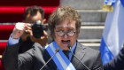 Argentina’s new President Javier Milei speaks outside Congress in Buenos Aires.