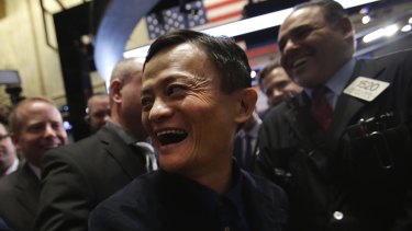 In happier days: Billionaire Jack Ma, chairman of Alibaba Group, on  the floor of the New York Stock Exchange at the Chinese company's listing in 2014.