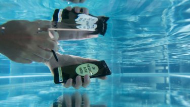 A Galaxy Note 7 phone submerged in water during Samsung’s marketing blitz.