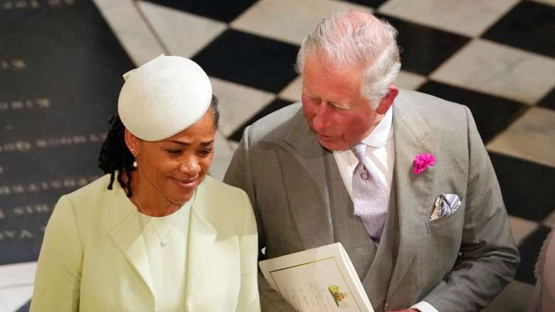Pangeran Charles dan Doria Ragland sesaat setelah upacara pernikahan Pangeran Harry dan Meghan Markle di Kapel St. George di Windsor Castle di Windsor, Sabtu (19/5/2018).