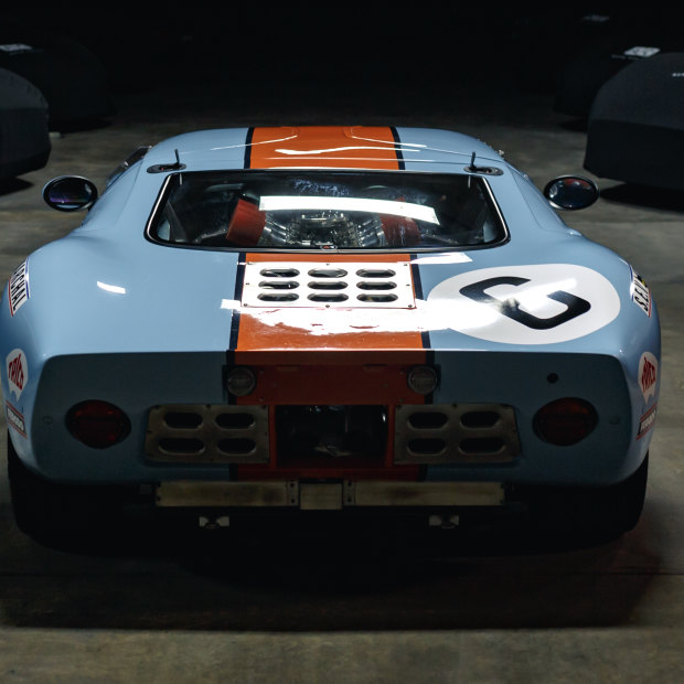 A blue and orange Ford GT40 sits in storage at the top-secret Auto Cache facility. 
