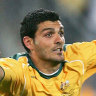 SYDNEY, NSW - NOVEMBER 16:  John Aloisi of the Socceroos celebrates scoring the winning goal in the penalty shootout during the second leg of the 2006 FIFA World Cup qualifying match between Australia and Uruguay at Telstra Stadium November 16, 2005 in Sydney, Australia.  (Photo by Cameron Spencer/Getty Images) *** Local Caption *** John Aloisi