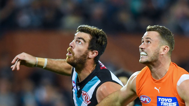Scott Lycett of Port Adelaide rucks against Kieren Briggs of the Giants.