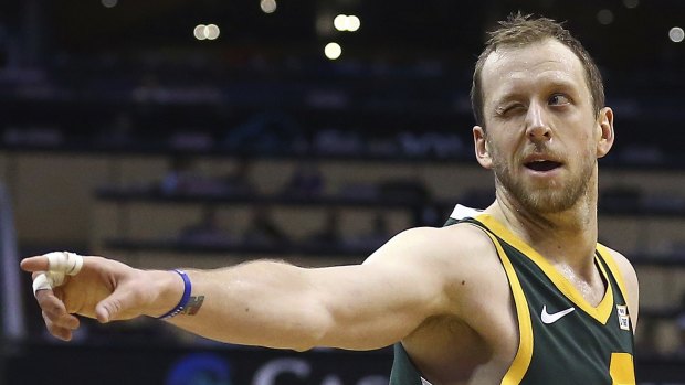 Joe Ingles winks at Jazz fans after making a three-pointer.