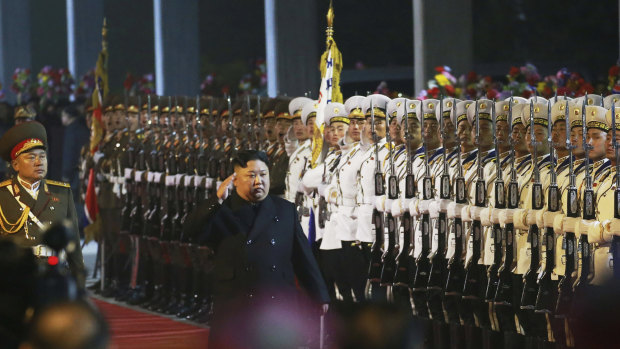 Kim Jong-un inspects an honour guard on his departure from North Korea. He is meeting with Russian President Vladimir Putin on Thursday.