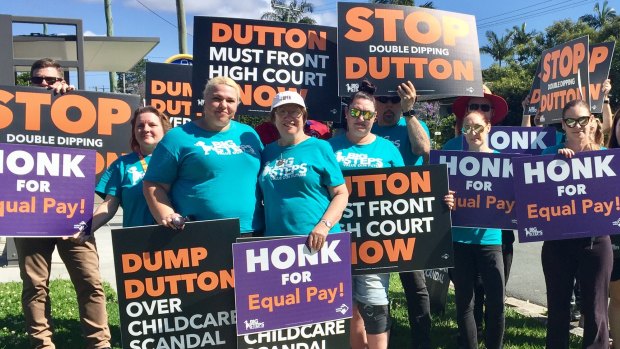 Protesters outside the centre run by the company operated by Peter Dutton's family trust.