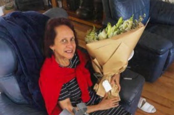 Beau Lamarre-Condon’s mother holding the flowers.