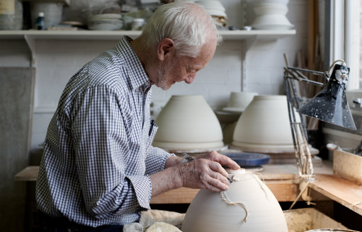 Blakebrough in the studio refining a pot’s base.
