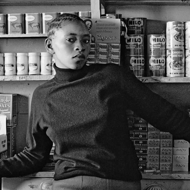 David Goldblatt "Shop  assistant,  Orlando West, 1972" silver gelatin photograph on fibre-based paper. Image courtesy Goodman  Gallery, Johannesburg and Cape Town. 