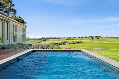 Former AFL star Tom Hawkins relists Barrabool farm with $365k price cut.